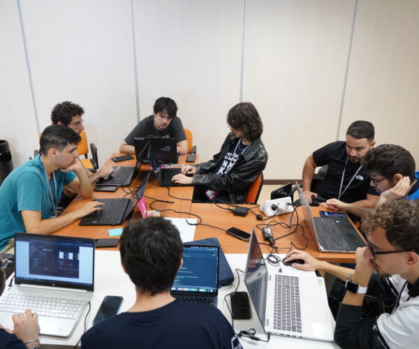 Teams and mentors at work during the Hackathon