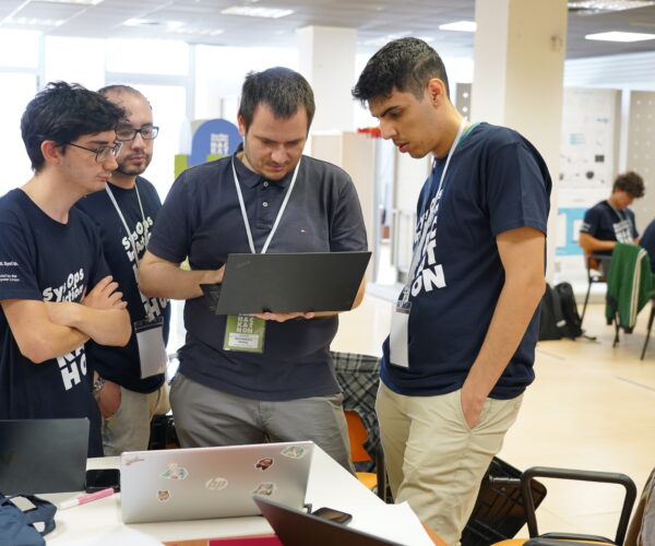 Teams and mentors at work during the Hackathon
